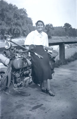 Posing by a Harley 