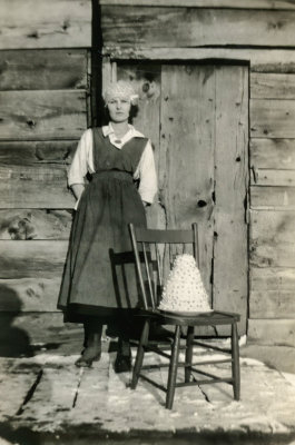 Lady Posing by a Chair 