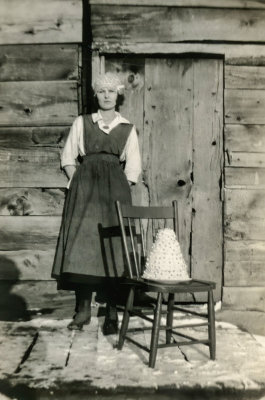 Lady Posing by a Chair