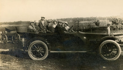 Family in a Large Car  