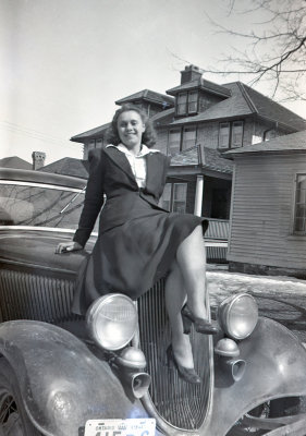 Lady Posing on a Car Hood  