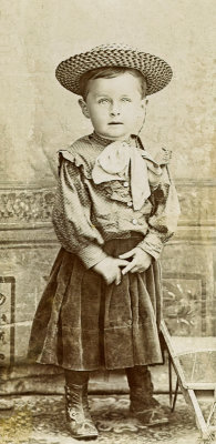 Young Boy Wearing a Hat  
