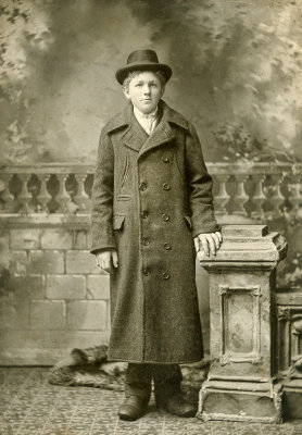 Young Man with a Long Coat  