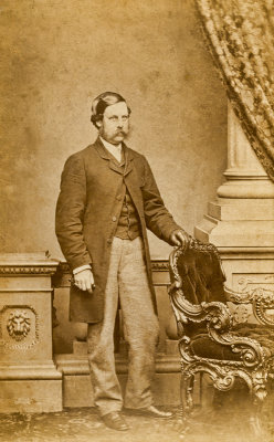Gentleman with a Gloved Hand on a Chair