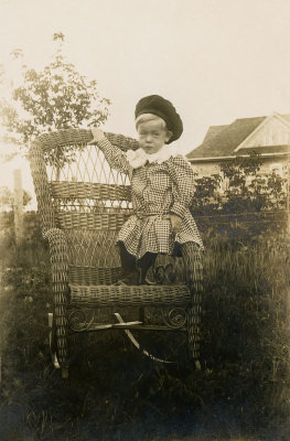 Child on a Wicker Chair 
