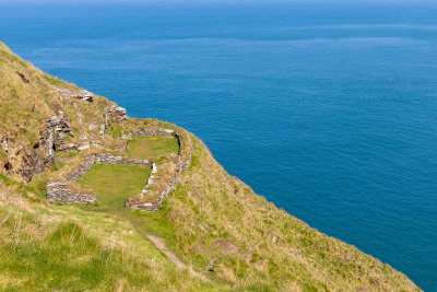 Tintagel Castle - The Northern ruins: when this area was cleared by Raleigh Radford in the 1930s  he found walls of several simp