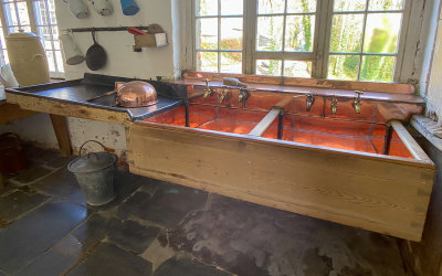 The Scullery - There are two 19th c. sinks. One is of pocelain for washing fine china and the other is copper lined.