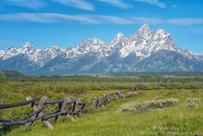 Teton range with fence line