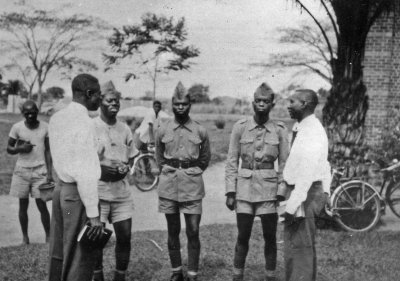 1954 - 1957 Discussion with local police outside church.jpg