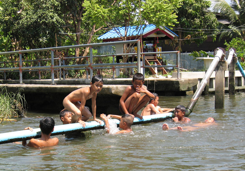Boys Swimming in a Klong