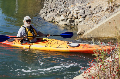 Kayak entering culvert.