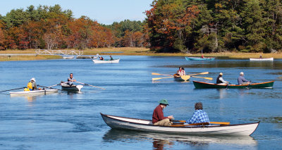Boats on marsh side.