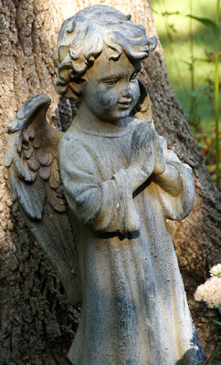Praying angel sculpture.