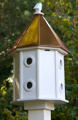 Birdhouse with copper roof.