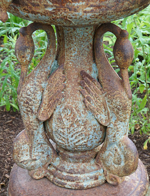 Dolphin planter, detail. Note they morph into birds.