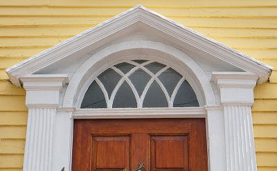 Door pediment. Pleasant Street.