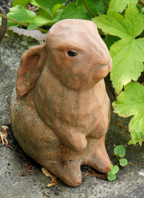 Orange rabbit sculpture.