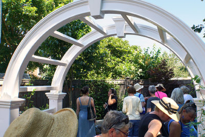 Visitors under arch.