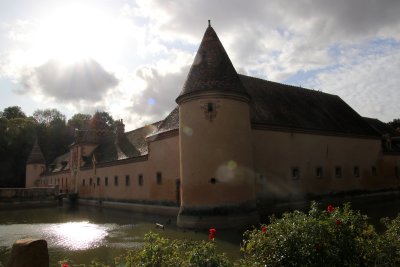 The castle surrounded by its moat