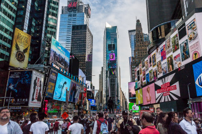 Windows That Surround the Chaos of Times Square