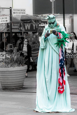 Lady Liberty Counting Her Money