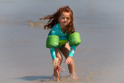 Teaching Barbi About the Sand Pulling Away From Your Feet