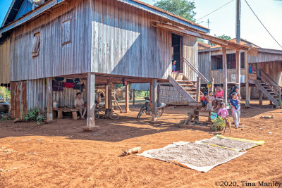 Home and Family with Drying Rice