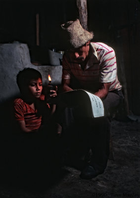 Manuel and Victor Reading by Candlelight, III