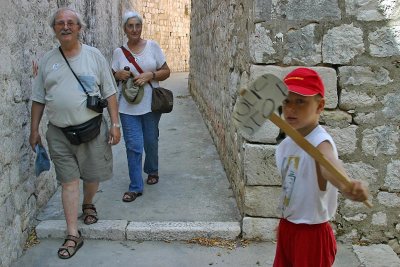 Dubrovnik Old Town, this little boy was having fun regulating traffic