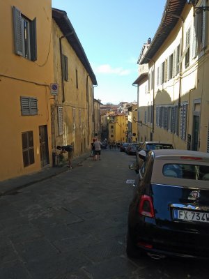 Houses curving down the street to the Arno