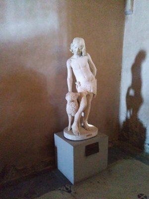 Curious Shepherd boy sculpture in the crypt