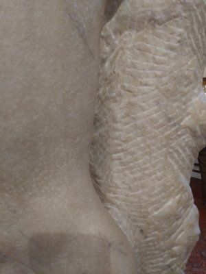 Unfinished back chisel marks