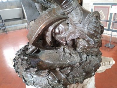 Goliath's head with David's toes curling around it