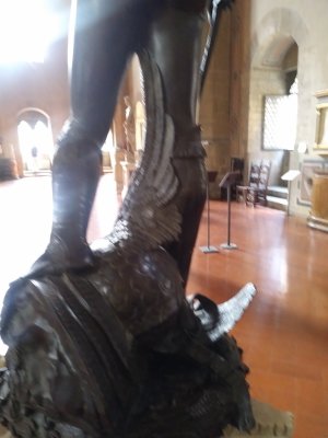 Notice the huge feather on the giant helmet directing the eyes up