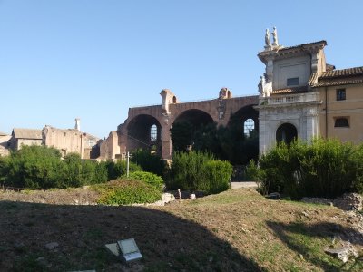 Ruins of the Basilica of Constantine, Roman hall of justice, with facade of Basilica Saint Francesca Romana in right forefront