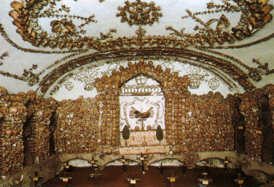 Crypt of the Leg Bones and Thigh Bones featuring the severed, crossed arms that make up the Capuchin's coat of arms.