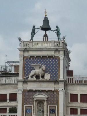 Clock Tower-Alert winged lion, symbol of St Mark & the city, looks down. His book reads Pax Tibi Marce-Peace to you, Mark.