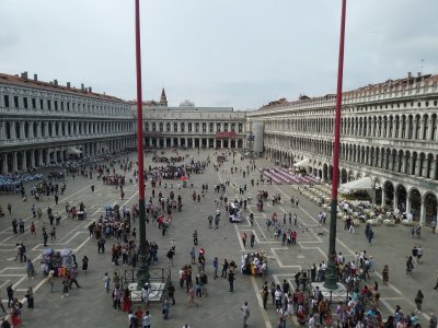 St Mark's Piazza from the balcony. Napoleon's architects tried to make his wing bridge the styles of the side wings