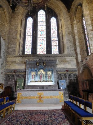 A misericord is a small wooden shelf on the underside of a folding seat intended to support one standing for long prayers
