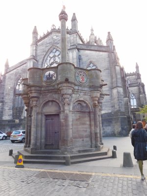 The Mercat Cross on Edinburgh's Royal Mile. An 1885 replacement of the original cross removed in 1756.