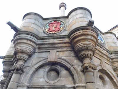 Mercat Cross where historically the right to hold a regular market or fair was granted by the monarch, a bishop or a baron