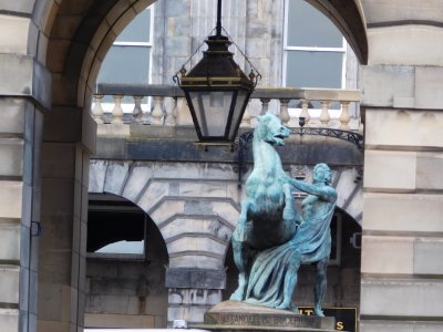 Bronze statue of Alexander the Great taming his horse, Bucephalus located in front of Edinburgh's City Chambers 