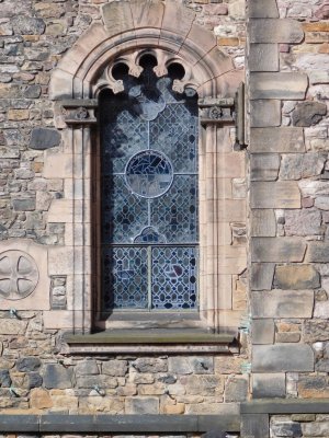The Scottish National War Memorial stained-glass windows are by Douglas Strachan