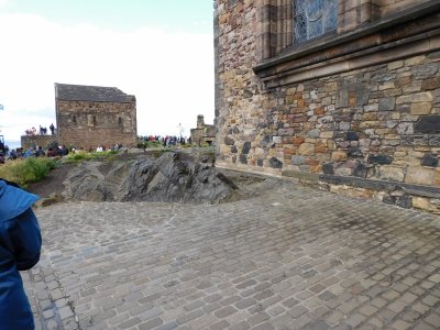 The Castle Rock is the remains of the volcanic pipe, which cut through the surrounding sedimentary rock