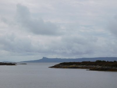 The small Isle Eigg with the cliff from Traigh Beach