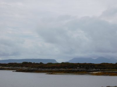 Eigg to the left with the much larger Isle of Rum covered by clouds