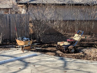 By the time I got out to take some photos of the progress, the guys had already planted flags all over the yard and started digging trenches for PVC pipes and wires.