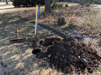 They dug a big hole out front to connect everything to the main water line.