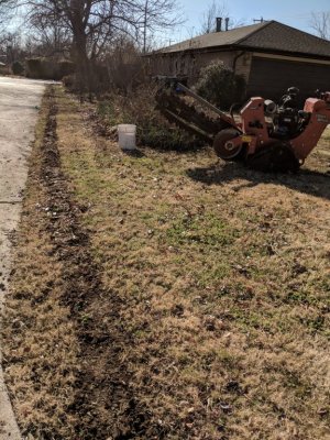 Already-buried line along west side of driveway; they did a nice job of filling the trenches and tidying up after themselves