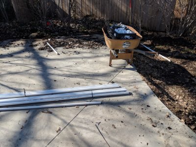 PVC pipe and a wheelbarrow full of connectors